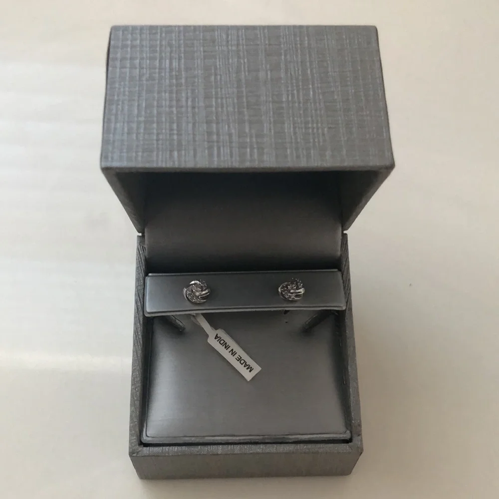 1/8 CT. T.W. Diamond Love Knot Stud Earrings in 20K White Gold - Picture 2 of 5